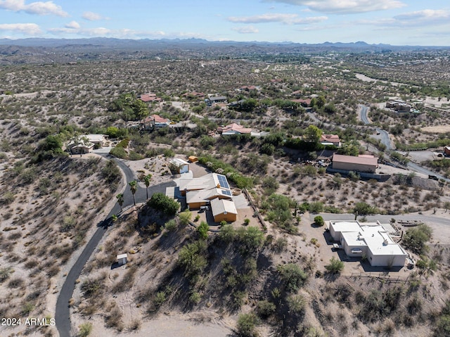 drone / aerial view featuring a mountain view