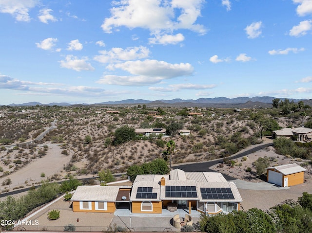 drone / aerial view featuring a mountain view