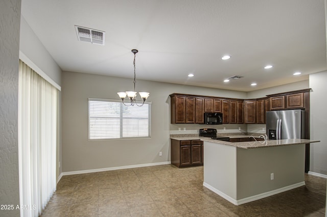 kitchen featuring black appliances, an inviting chandelier, visible vents, and baseboards