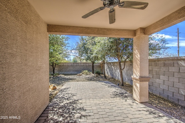 view of patio / terrace with ceiling fan and a fenced backyard