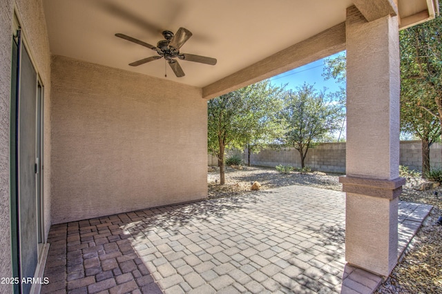 view of patio / terrace featuring a fenced backyard and a ceiling fan