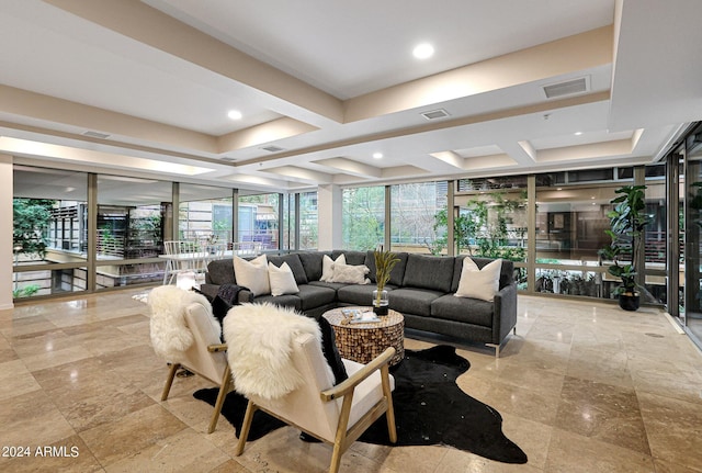 living area featuring recessed lighting and visible vents