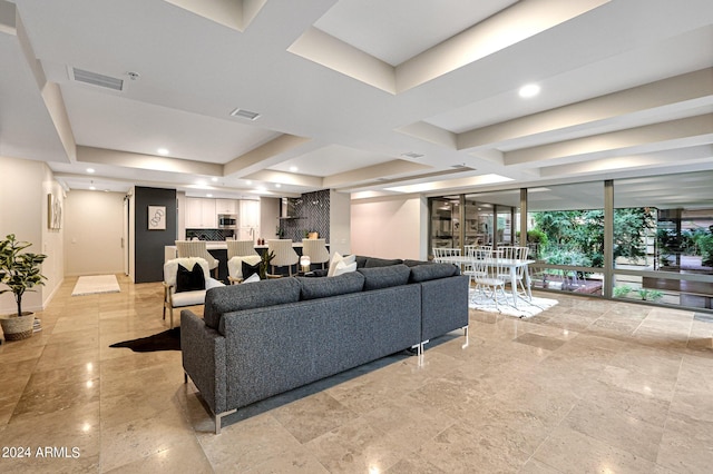 living room featuring recessed lighting and visible vents