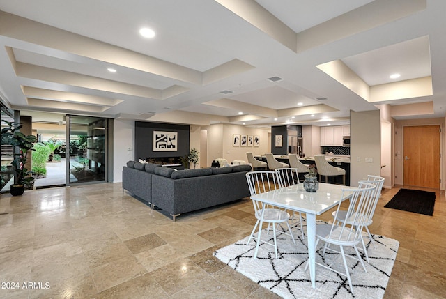 dining space with recessed lighting, visible vents, and a fireplace