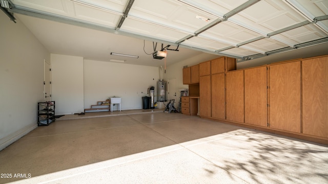 garage featuring secured water heater and a garage door opener