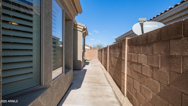 view of patio / terrace featuring fence