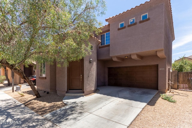 10331 W Devonshire Ave, Phoenix, AZ 85037 - view of front of property with stucco siding, a garage, driveway, and a tiled roof