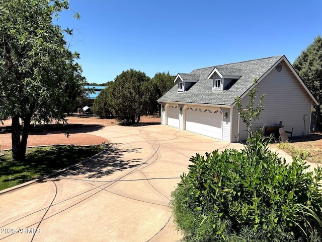 2404 W Palmer Dr, Payson, AZ 85541 - view of home's exterior with concrete driveway, roof with shingles, and a garage