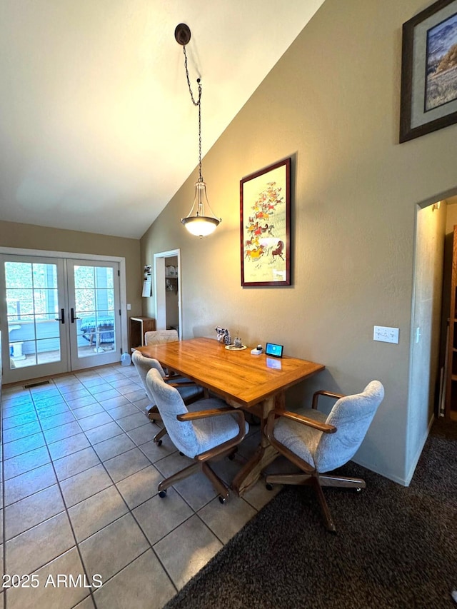 2404 W Palmer Dr, Payson, AZ 85541 - tiled dining room featuring french doors and high vaulted ceiling