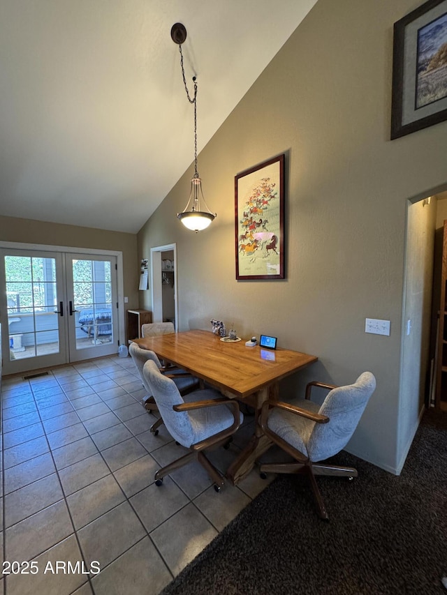 2404 W Palmer Dr, Payson, AZ 85541 - dining space with french doors, high vaulted ceiling, and tile patterned floors