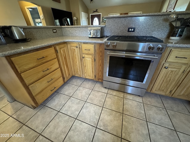 2404 W Palmer Dr, Payson, AZ 85541 - kitchen featuring high end stove and light tile patterned floors