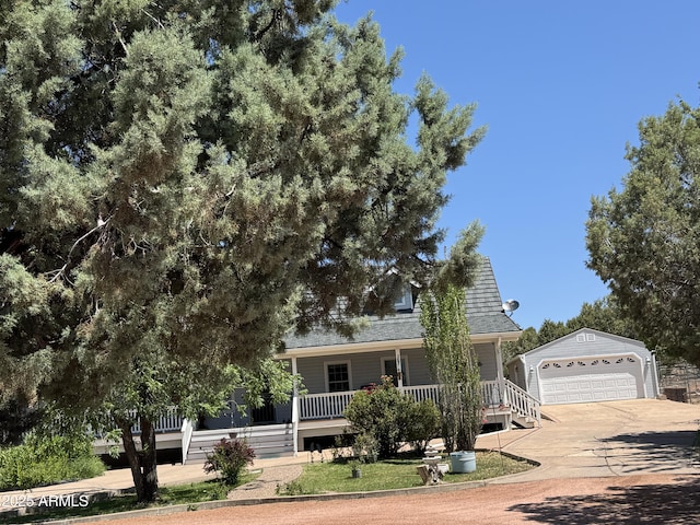 2404 W Palmer Dr, Payson, AZ 85541 - view of property hidden behind natural elements with covered porch, an outdoor structure, and a garage
