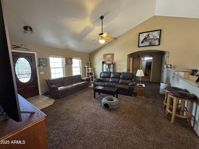 2404 W Palmer Dr, Payson, AZ 85541 - carpeted living room with ceiling fan, arched walkways, and high vaulted ceiling