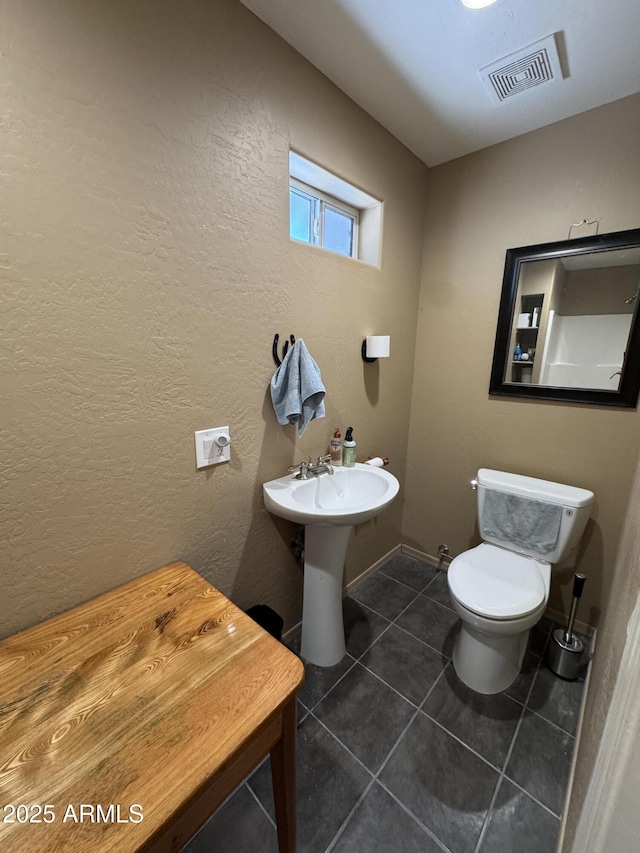 2404 W Palmer Dr, Payson, AZ 85541 - bathroom with tile patterned floors and a textured wall