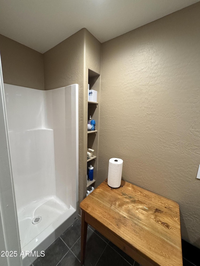 2404 W Palmer Dr, Payson, AZ 85541 - bathroom featuring a textured wall, tile patterned floors, and a stall shower