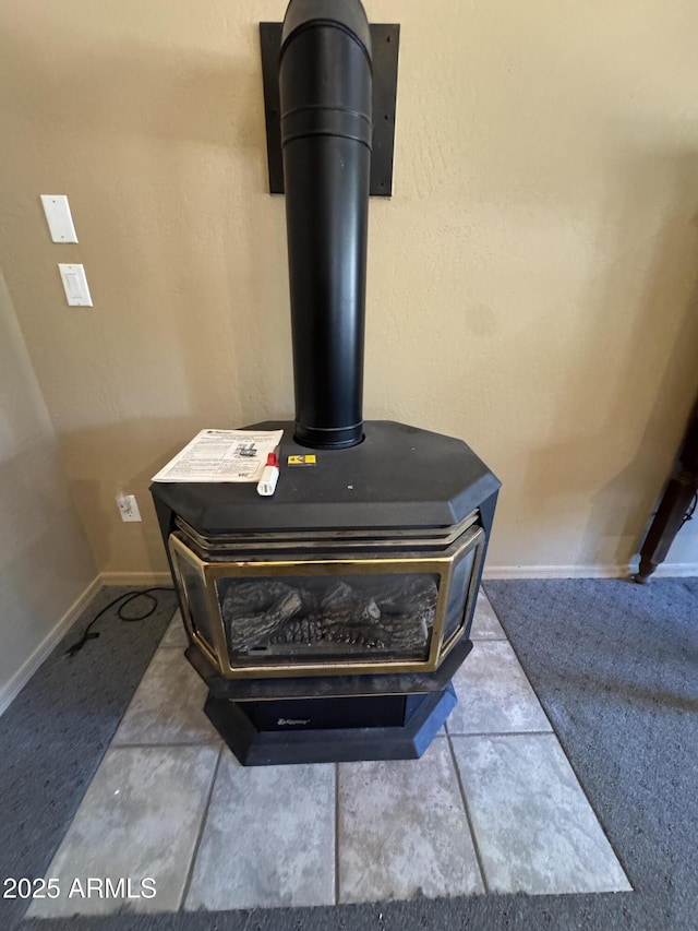 2404 W Palmer Dr, Payson, AZ 85541 - detailed view of a wood stove and baseboards
