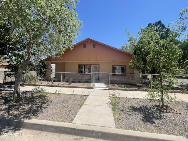 403 E 6th St, Douglas, AZ 85607 - bungalow-style house featuring a fenced front yard and a gate