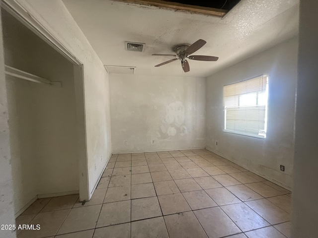 403 E 6th St, Douglas, AZ 85607 - unfurnished bedroom featuring light tile patterned floors and ceiling fan