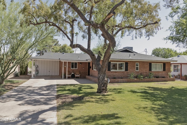 1839 E Palo Verde Dr, Phoenix, AZ 85016 - ranch-style house featuring concrete driveway, a front lawn, an attached carport, and brick siding