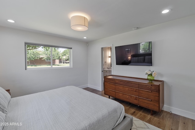 1839 E Palo Verde Dr, Phoenix, AZ 85016 - bedroom featuring baseboards, wood finished floors, and recessed lighting