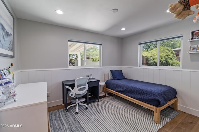 1839 E Palo Verde Dr, Phoenix, AZ 85016 - bedroom featuring wainscoting, wood finished floors, an office area, and recessed lighting