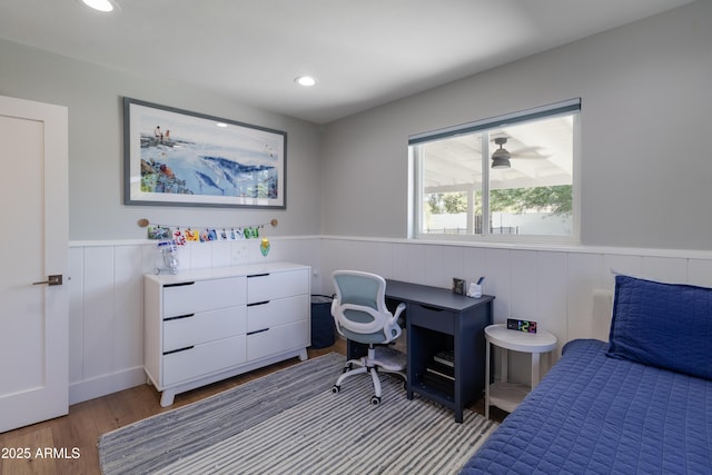 1839 E Palo Verde Dr, Phoenix, AZ 85016 - bedroom with light wood-type flooring, wainscoting, recessed lighting, and a decorative wall