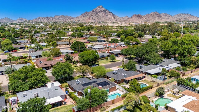 1839 E Palo Verde Dr, Phoenix, AZ 85016 - aerial perspective of suburban area featuring a pool area and a mountain backdrop