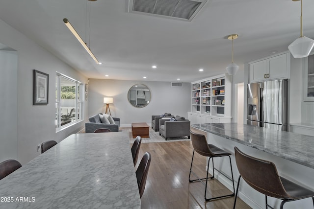 1839 E Palo Verde Dr, Phoenix, AZ 85016 - dining room featuring recessed lighting and wood finished floors