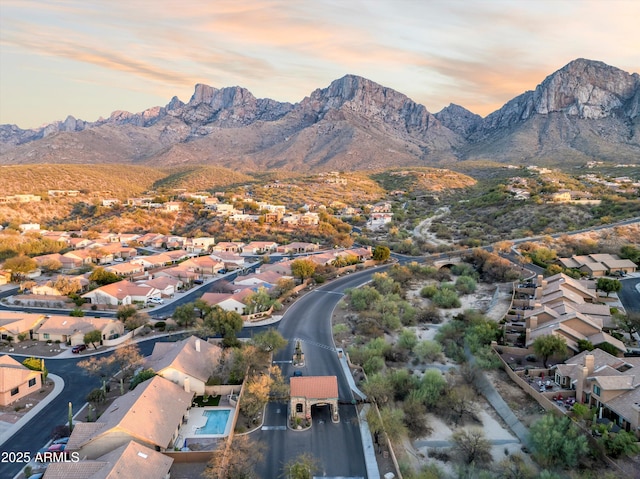 1705 E Deer Shadow Ln, Tucson, AZ 85737 - aerial view at dusk of a mountain view and a residential view