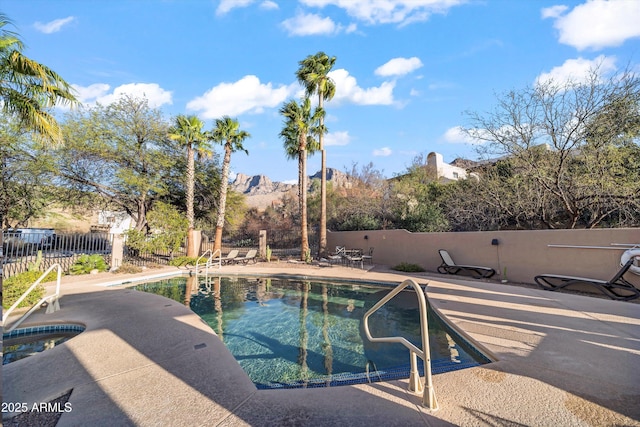 1705 E Deer Shadow Ln, Tucson, AZ 85737 - view of swimming pool featuring an in-ground hot tub, a patio, and a mountain view