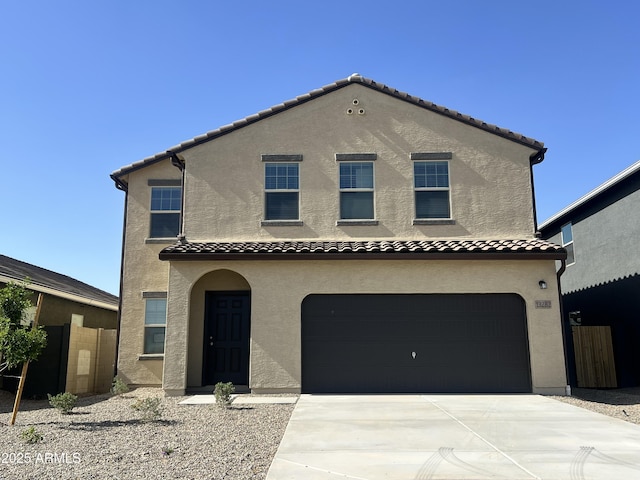13282 E Verbina Ln, Florence, AZ 85132 - mediterranean / spanish-style home with a tile roof, an attached garage, stucco siding, and concrete driveway