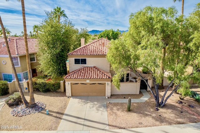 view of front of property with a garage