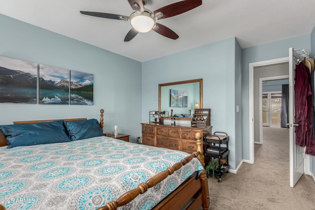 bedroom featuring light carpet and ceiling fan