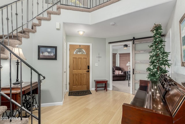 entryway with wood-type flooring