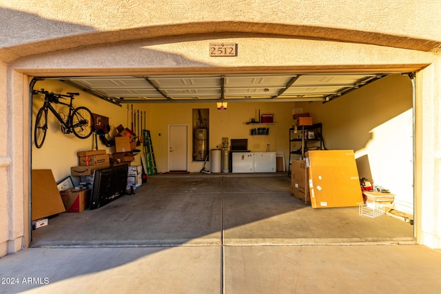 garage with strapped water heater