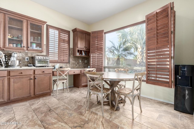 kitchen with tasteful backsplash