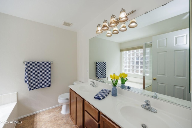 full bath featuring toilet, baseboards, visible vents, and a sink
