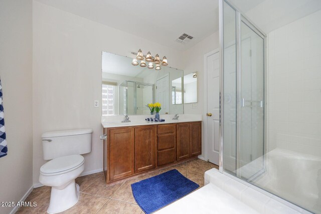 full bath with a sink, tile patterned flooring, toilet, visible vents, and a stall shower