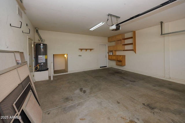 garage with water heater, a garage door opener, and visible vents