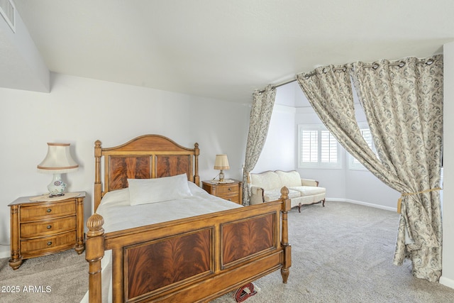 bedroom with visible vents, carpet, and baseboards