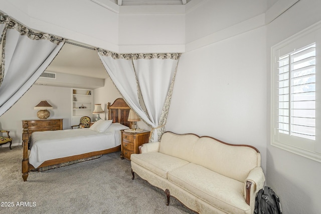 bedroom featuring carpet flooring and visible vents