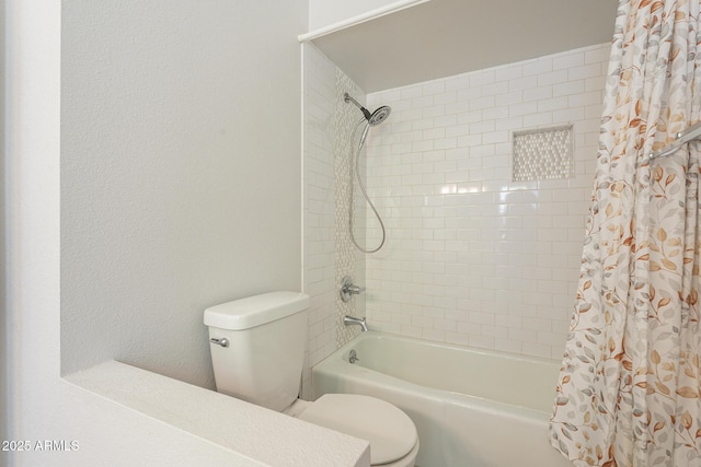 bathroom featuring toilet and shower / tub combo with curtain