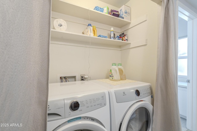 laundry area with laundry area and washing machine and dryer