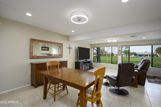 dining room featuring light tile patterned floors