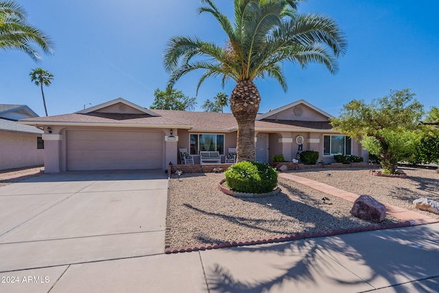 single story home featuring a garage