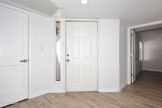 foyer featuring light hardwood / wood-style floors