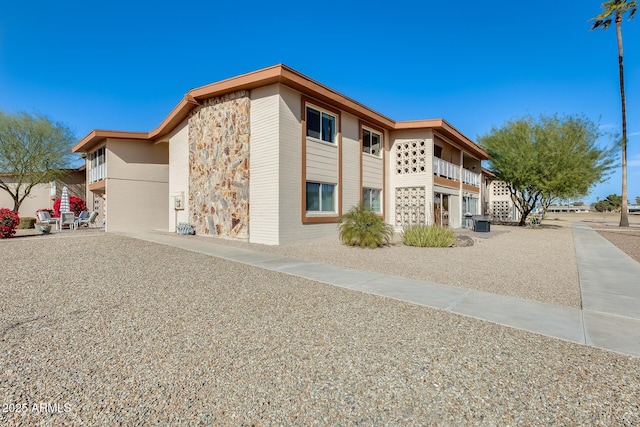 view of home's exterior with brick siding