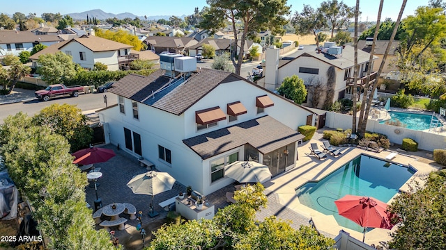 birds eye view of property featuring a mountain view