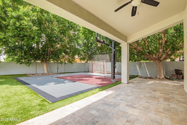 view of patio with a fenced backyard and ceiling fan