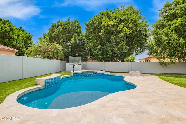 view of swimming pool featuring a fenced backyard, a patio area, and a pool with connected hot tub